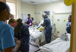 U.S. VIRGIN ISLANDS - SEPTEMBER 7: In this U.S. Navy handout, Hospital Corpsman 2nd Class Arinze Ugbah, assigned to Fleet Surgical team 2 (FST-2), provides aid to evacuees as part of first response efforts to the U.S. Virgin Islands in the wake of Hurricane Irma September 7, 2017. The Department of Defense is supporting Federal Emergency Management Agency (FEMA), the lead federal agency, in helping those affected by Hurricane Irma to minimize suffering and is one component of the overall whole-of-government response effort. (Photo by Levingston Lewis/U.S. Navy via Getty Images)